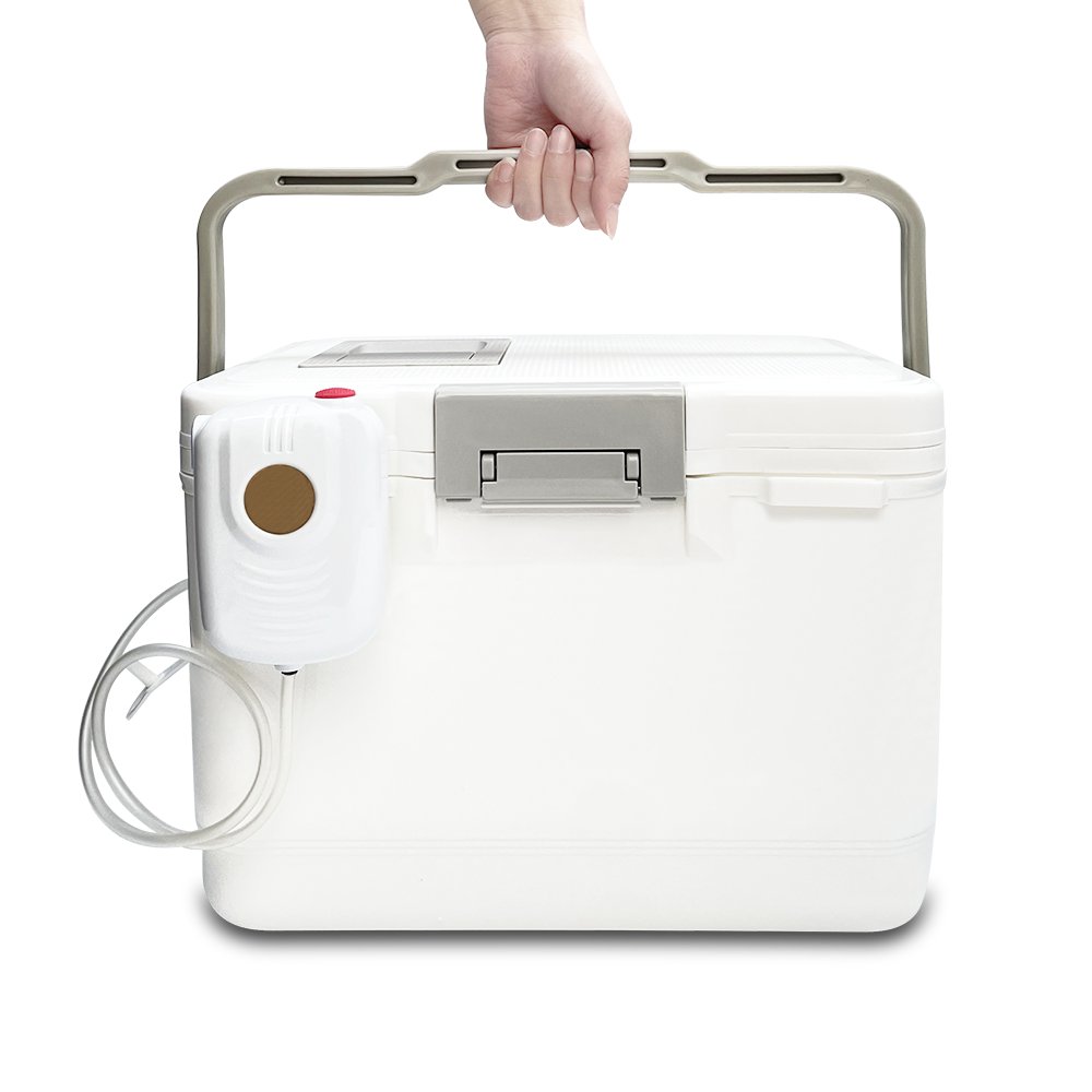 An outdoor cooling box with a tank full of fish and shrimp